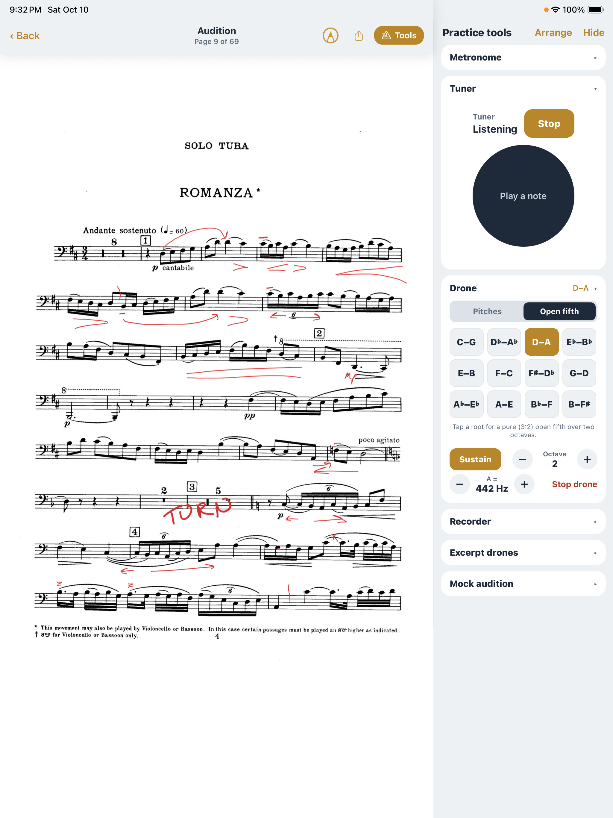 A solo tuba part open on iPad with pencil markings, and the practice tools panel beside it showing the tuner and open-fifth drones